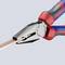 Pliers with a red and blue rubber grip are holding a flat piece of copper. Tool suitable for precise gripping and cutting.