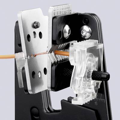 A tool that precisely strips an orange cable. Suitable for precise work in cable engineering.