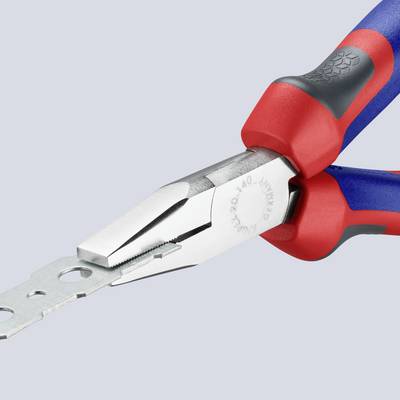 A pair of pliers grips a flat metal part. The pliers have red and blue rubber handles. They are placed against a light background.