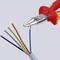 'Knipex wire strippers remove plastic sheathing from multi-core cable; blue, orange, green, grey wires visible.'