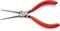 Red pointed pliers with "KNIPEX" and "Chrome Vanadium" labelling on the handles, used for gripping and bending wires.