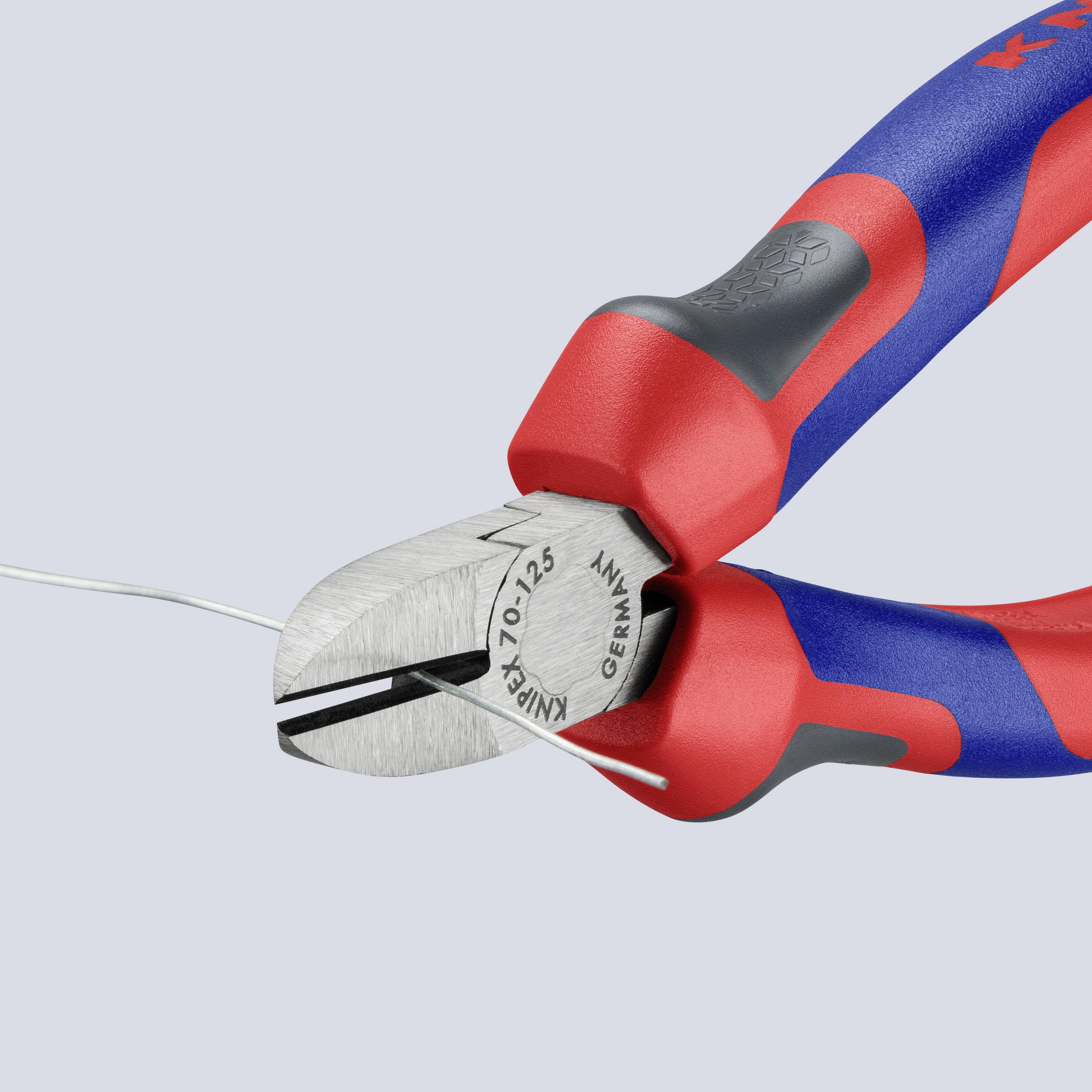 A red and blue combination pliers cuts through a thin wire. The handles are ergonomically shaped.