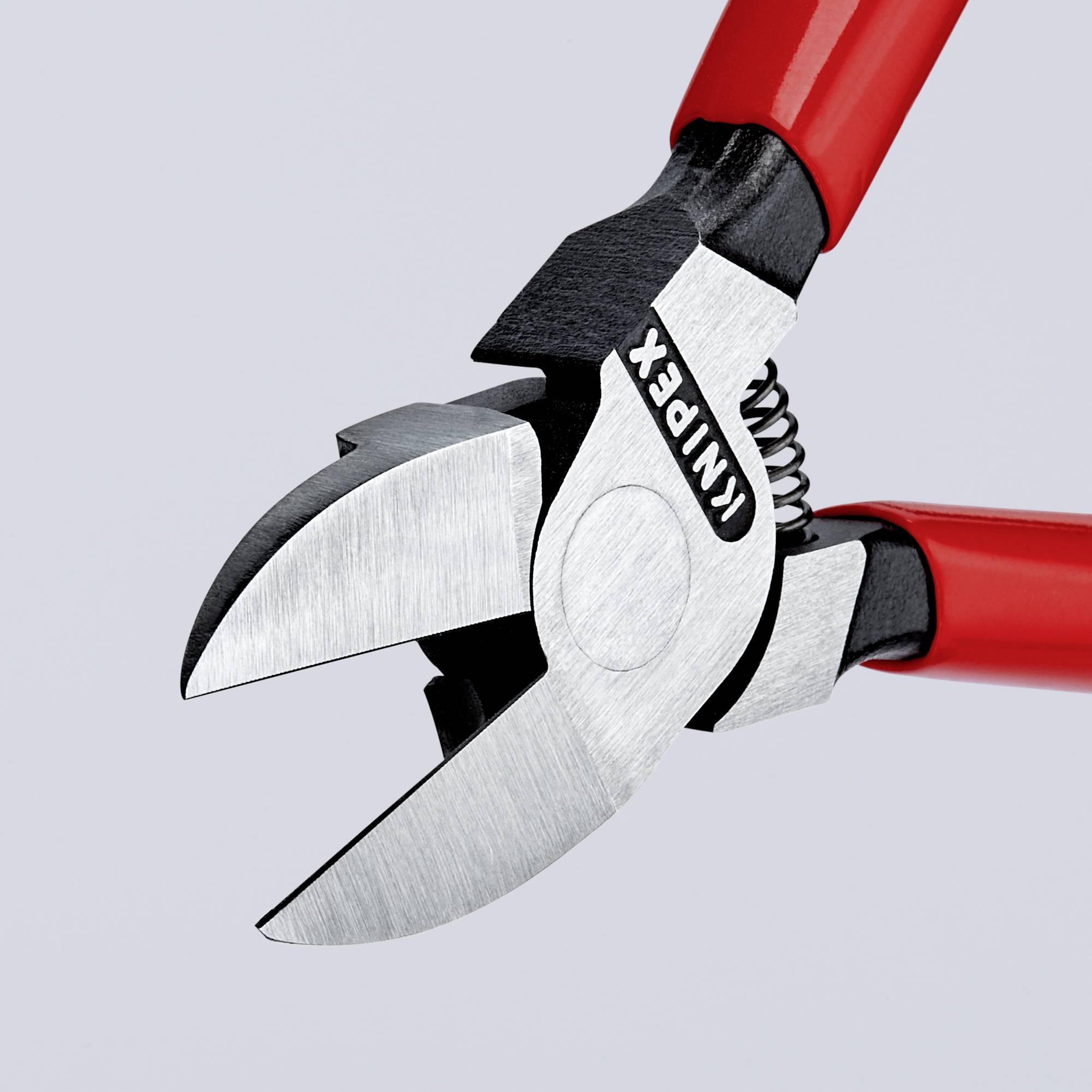 Red side-cutting pliers with black handle against a grey background, manufactured by Knipex, suitable for cutting wires.