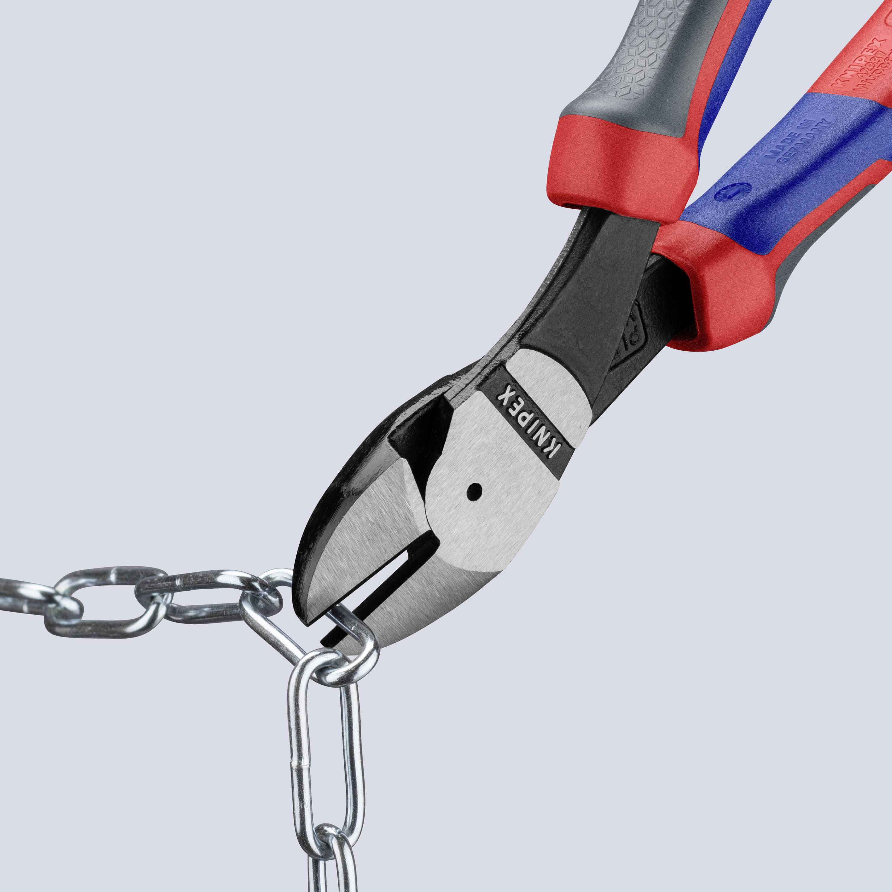 A red and blue pair of pliers cuts through a metal chain.