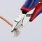 A pair of pliers cuts through a cable, with copper wires exposed. The tool is partially coloured blue and red.
