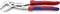 Description: 'KNIPEX Cobra' pliers with red and blue handle. Text on the pliers: 'self-locking', size '87 05 300'.
