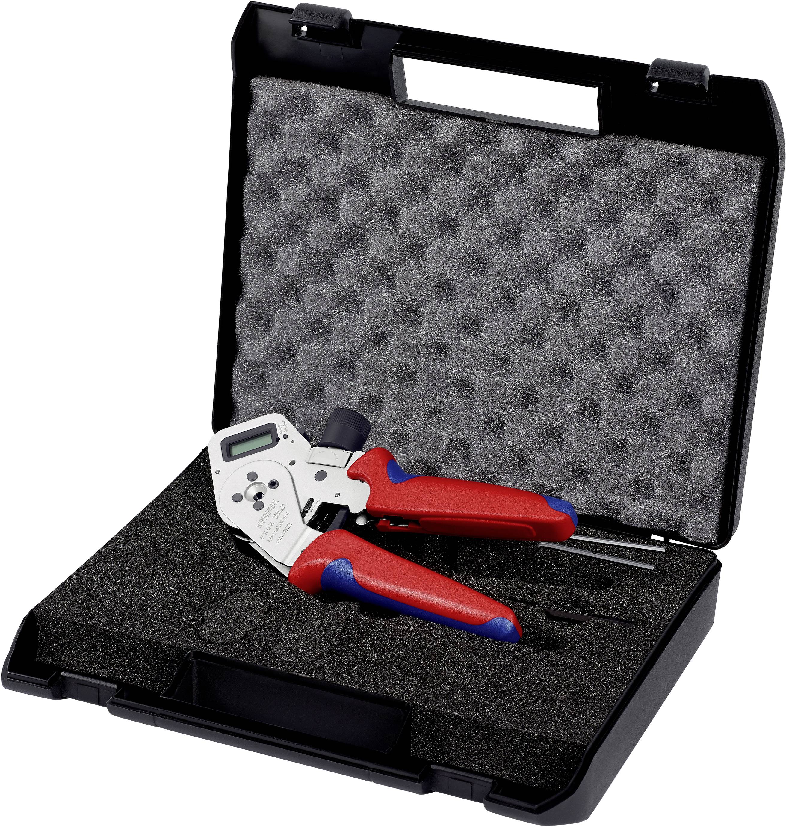 A crimping pliers with red handles lies in an open black case with foam lining.
