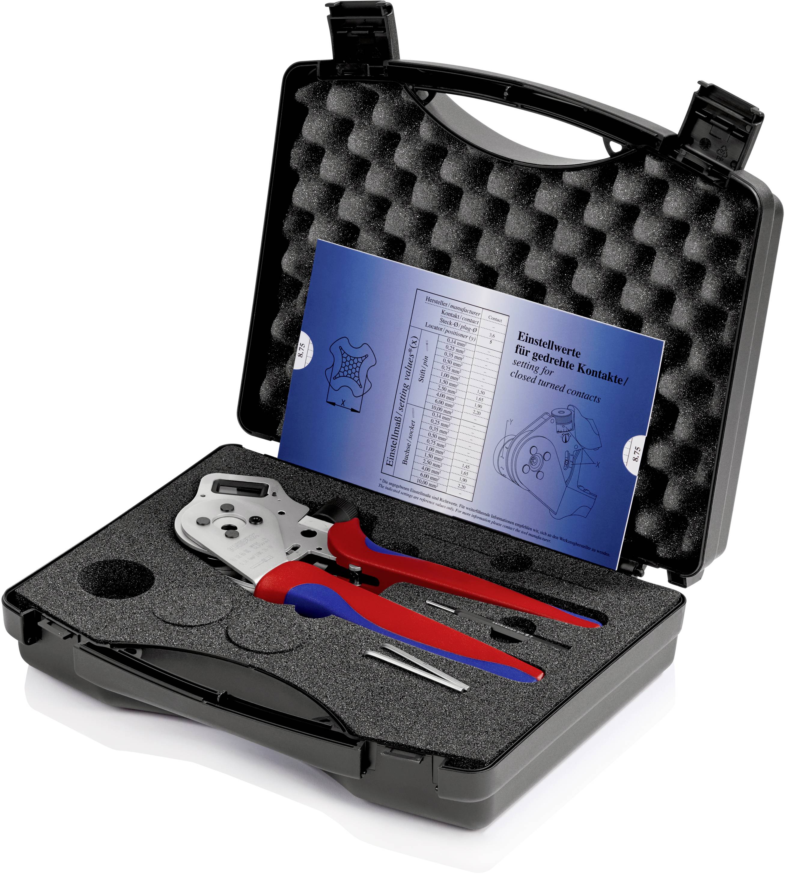 An open black case containing a crimping tool, a booklet with connection tables, and accessory parts.