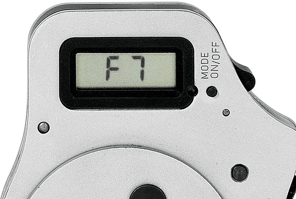Close-up of an electronic device with a small display showing 'F7'. Next to it are the labels 'Mode' and 'On/Off'.