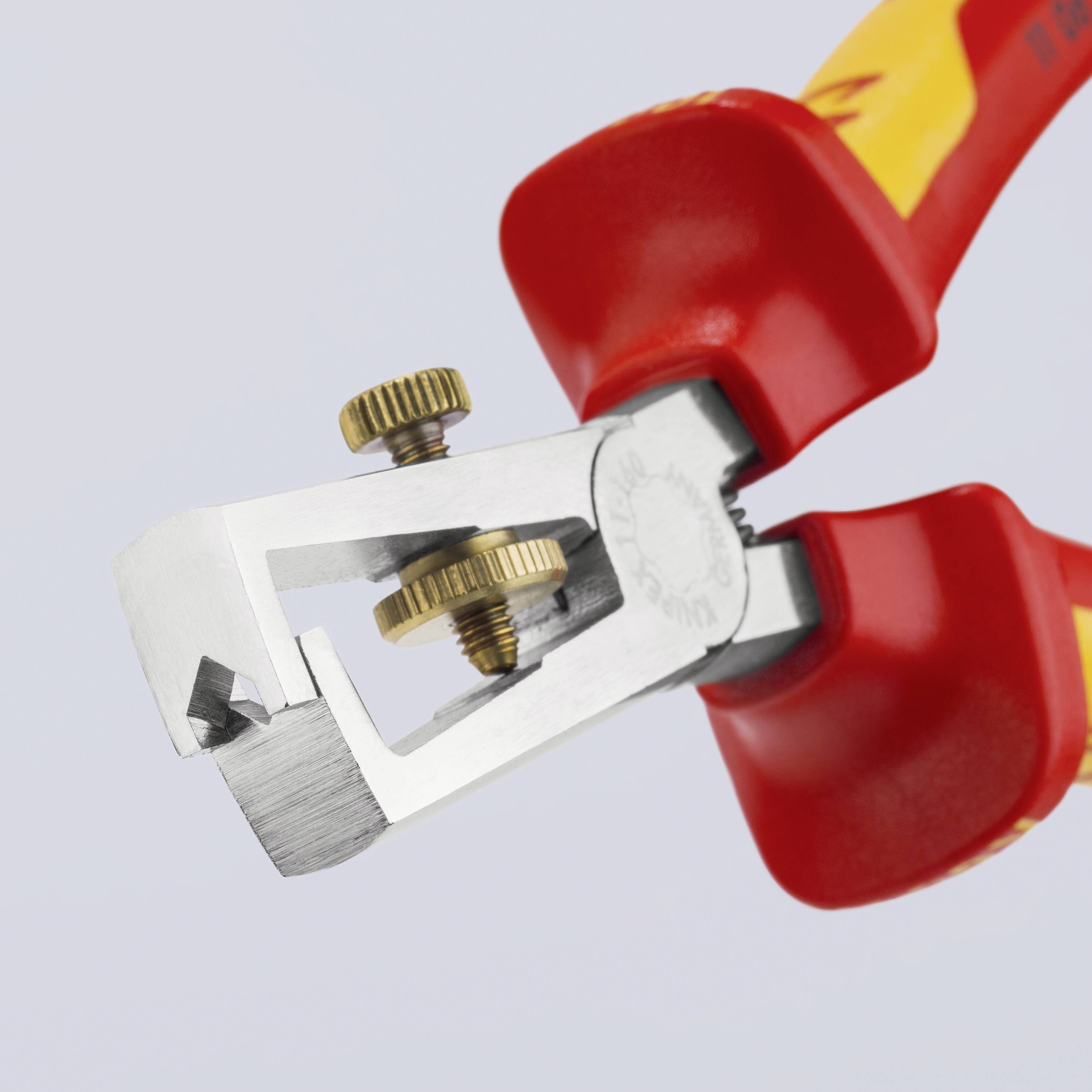 Close-up of a red wire stripping pliers with adjustable screws for precise cable stripping.