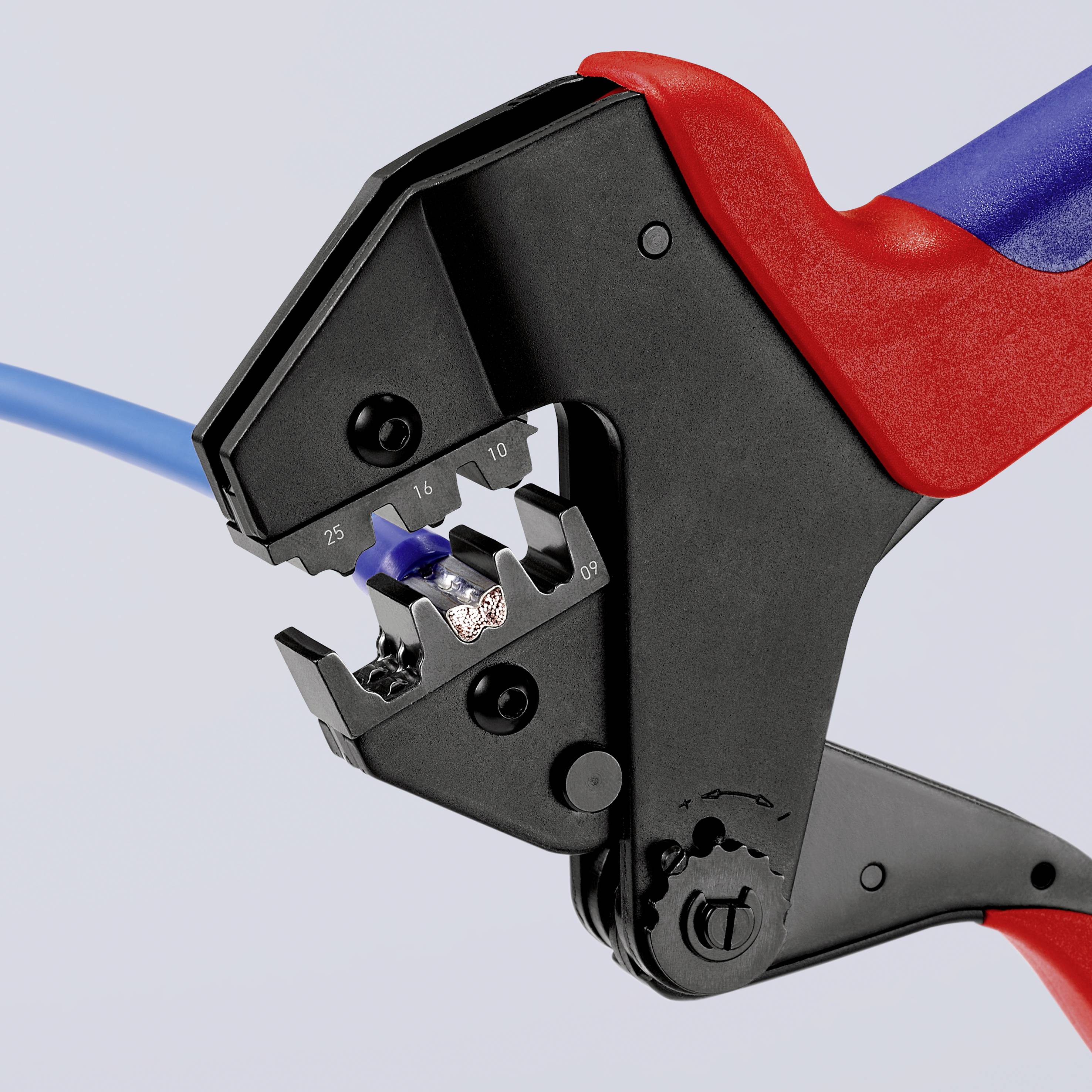 A crimping plier compresses a blue wire with a metal terminal. The handles are red and blue, with a neutral background.