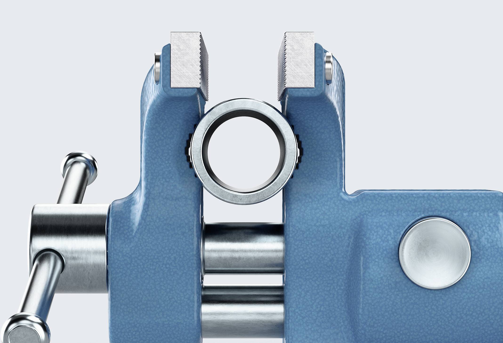 A metal vice is gripping a round pipe. The vice is blue and is positioned against a neutral background.