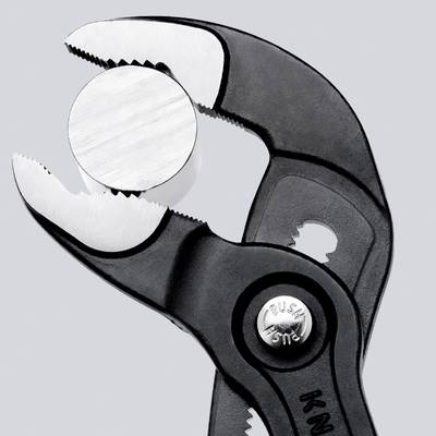 A water pump pliers holds a round metal nut firmly. The pliers are adjustable and show a detailed close-up of the jaws.