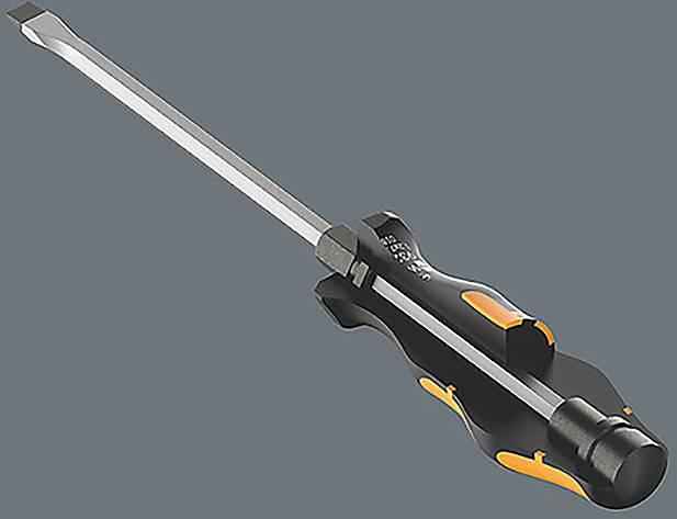 A flathead screwdriver with a black and orange ergonomic handle, lying diagonally on a gray background.