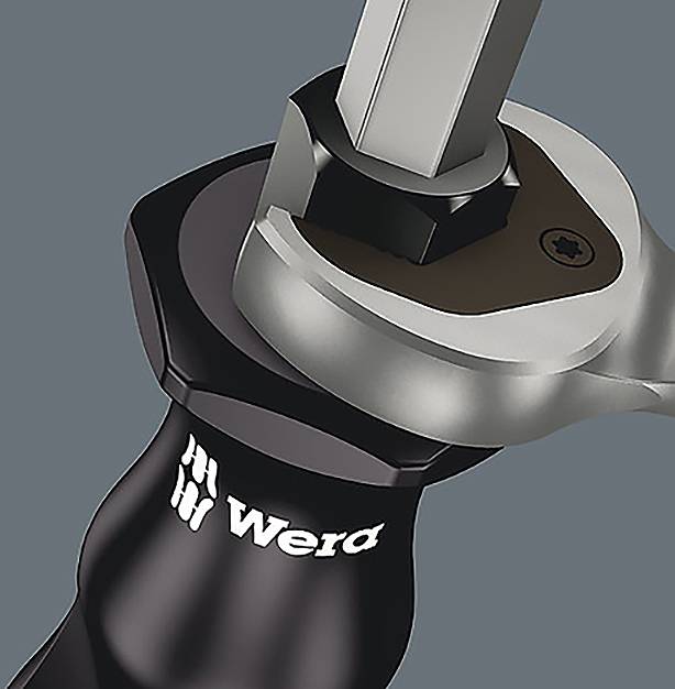 Close-up of a black and silver hex key tool with the brand name 'Wera' visible on the handle, set against a gray background.