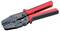 A pair of red and black crimping pliers with a metal head, designed for fastening and cutting wires, shown against a white background.