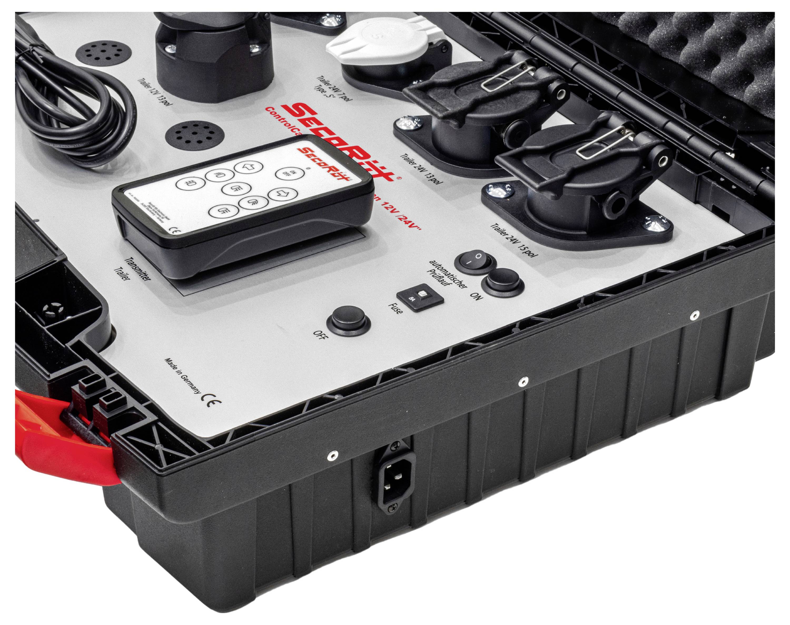 Portable briefcase with electronic ports, switches, and remote control, suitable for technical accessories and control.