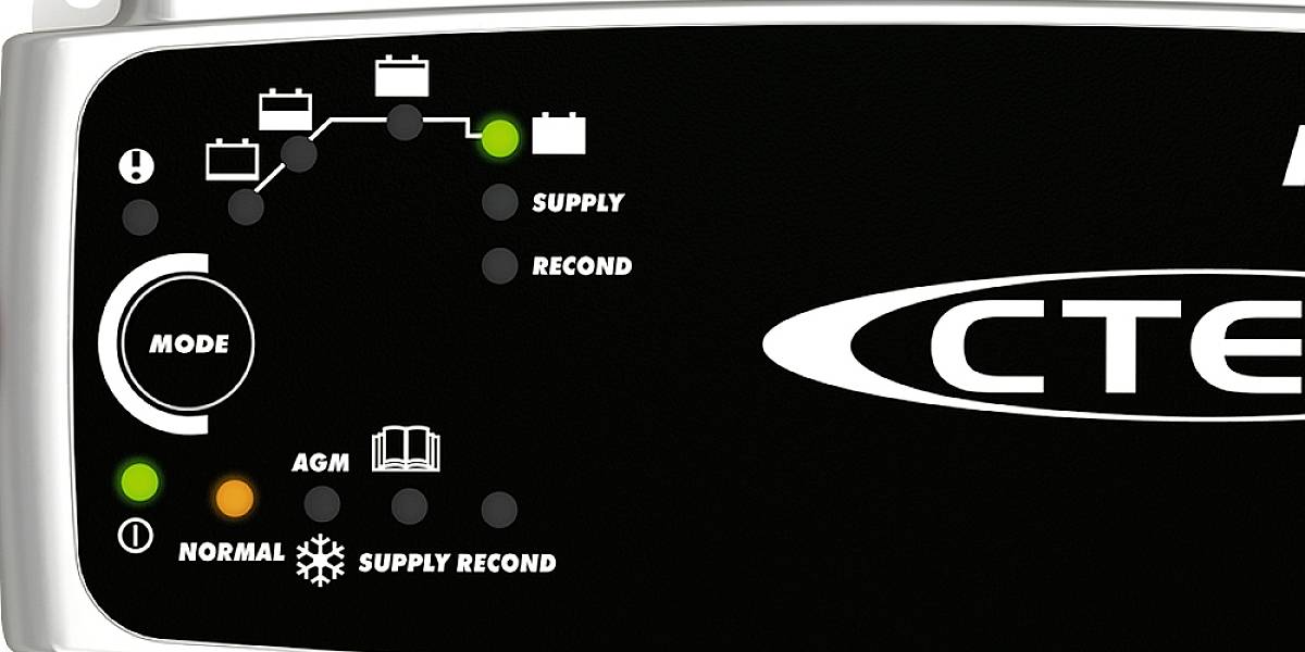 'CTEK Charger displays charging status and modes: Normal, AGM. Green LEDs indicate Supply, orange for Normal. Icons: Battery and Warning.'