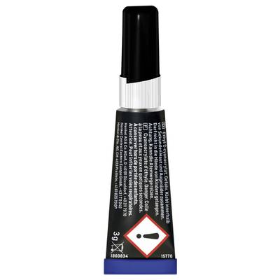 A tube of adhesive glue with a black cap, featuring a warning label displaying a hazard symbol and cautionary text in multiple languages.