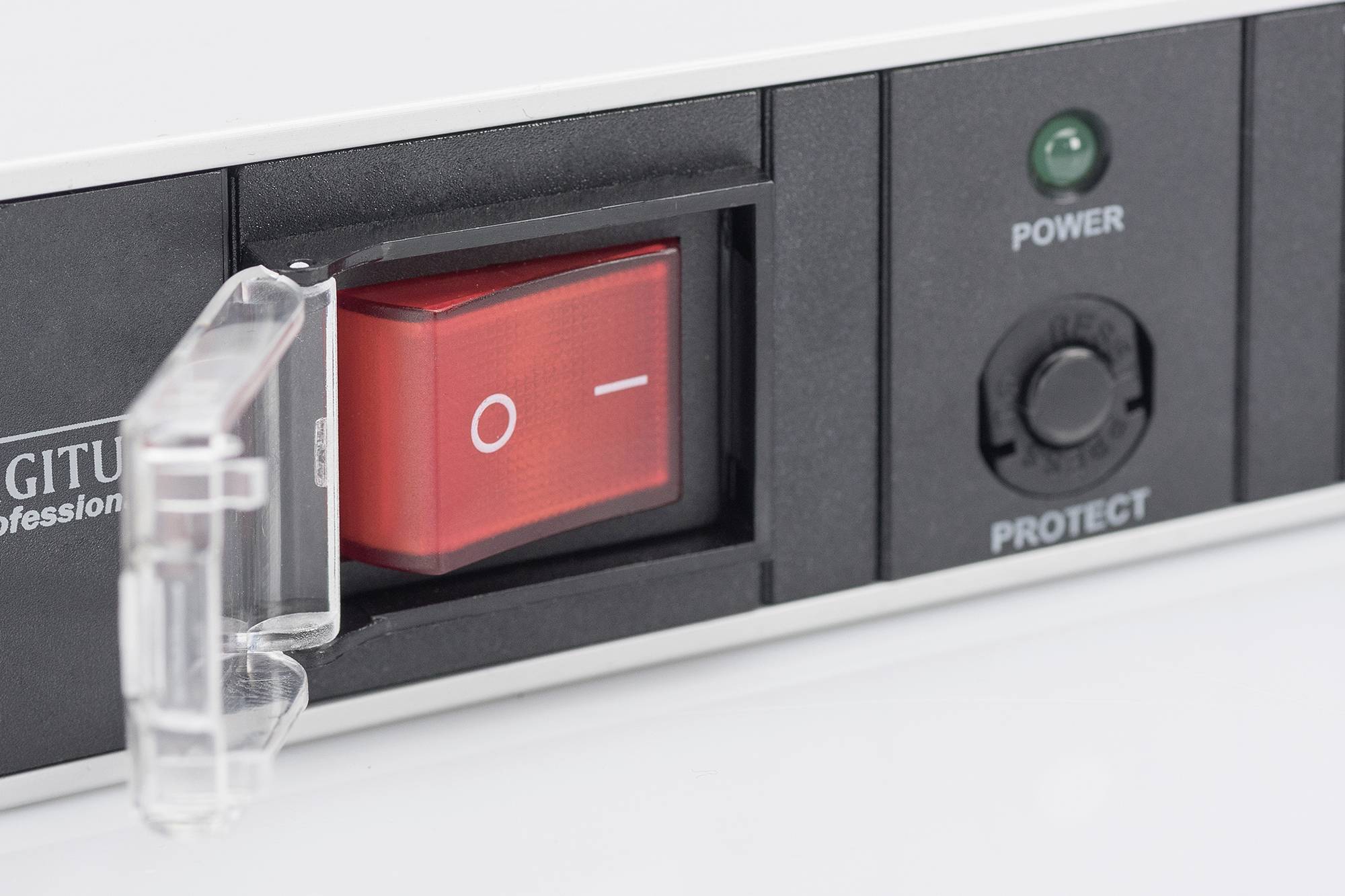 'Power management unit with red network switch, protective cover and green indicator light when switched on.'