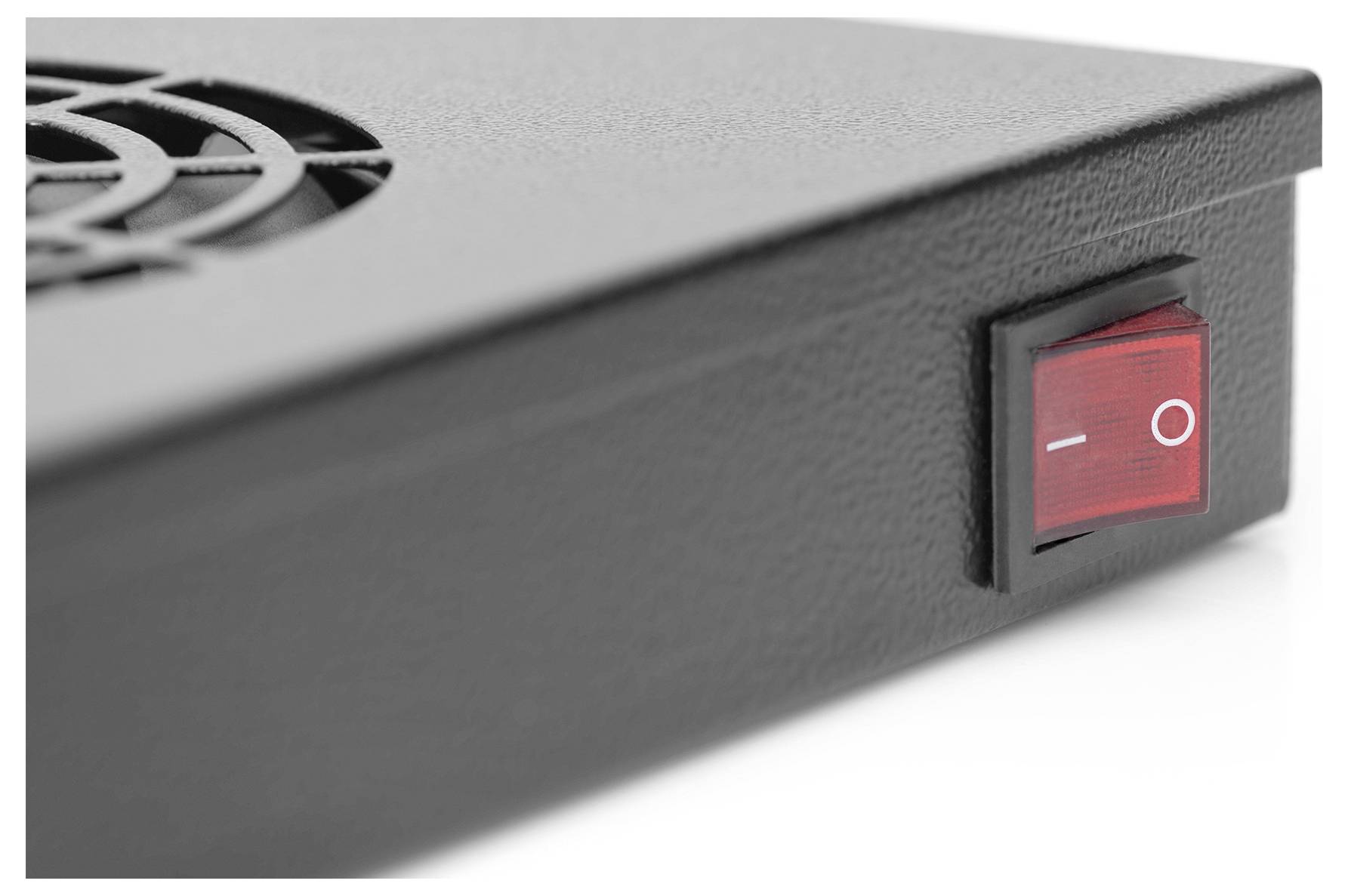A close-up of a black electronic device with a red power switch in the 'off' position and a ventilation grille on the surface.