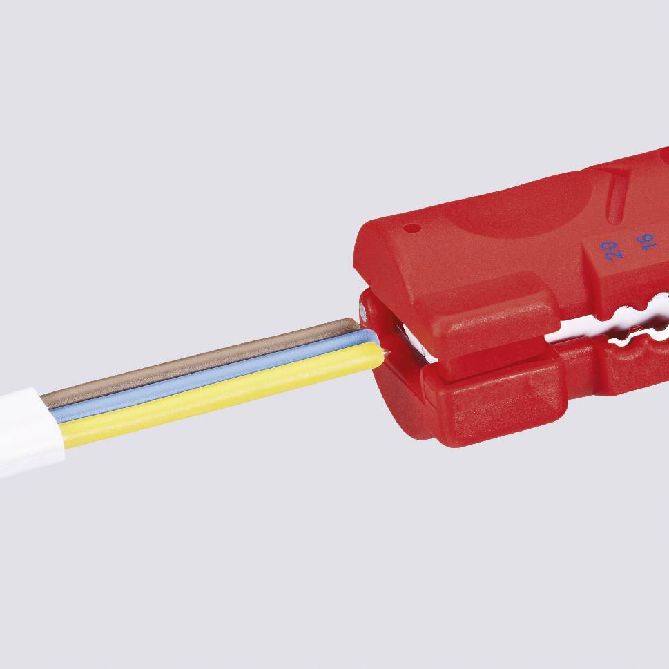 Close-up of a wire stripper showing cables with insulated wires of different colours.