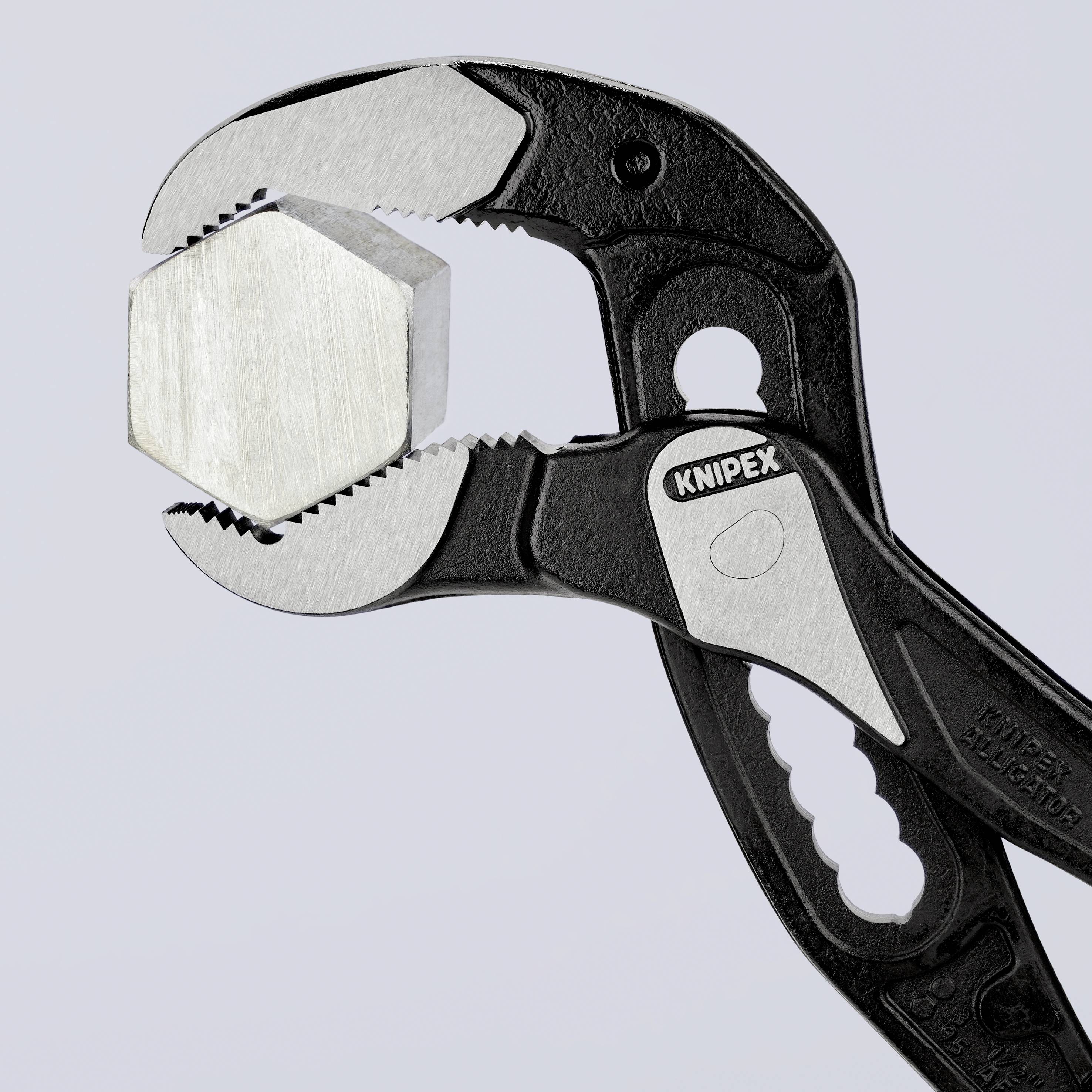 A closed pipe wrench firmly grips a hexagonal bolt nut, with a plain grey background, focusing on the tool.