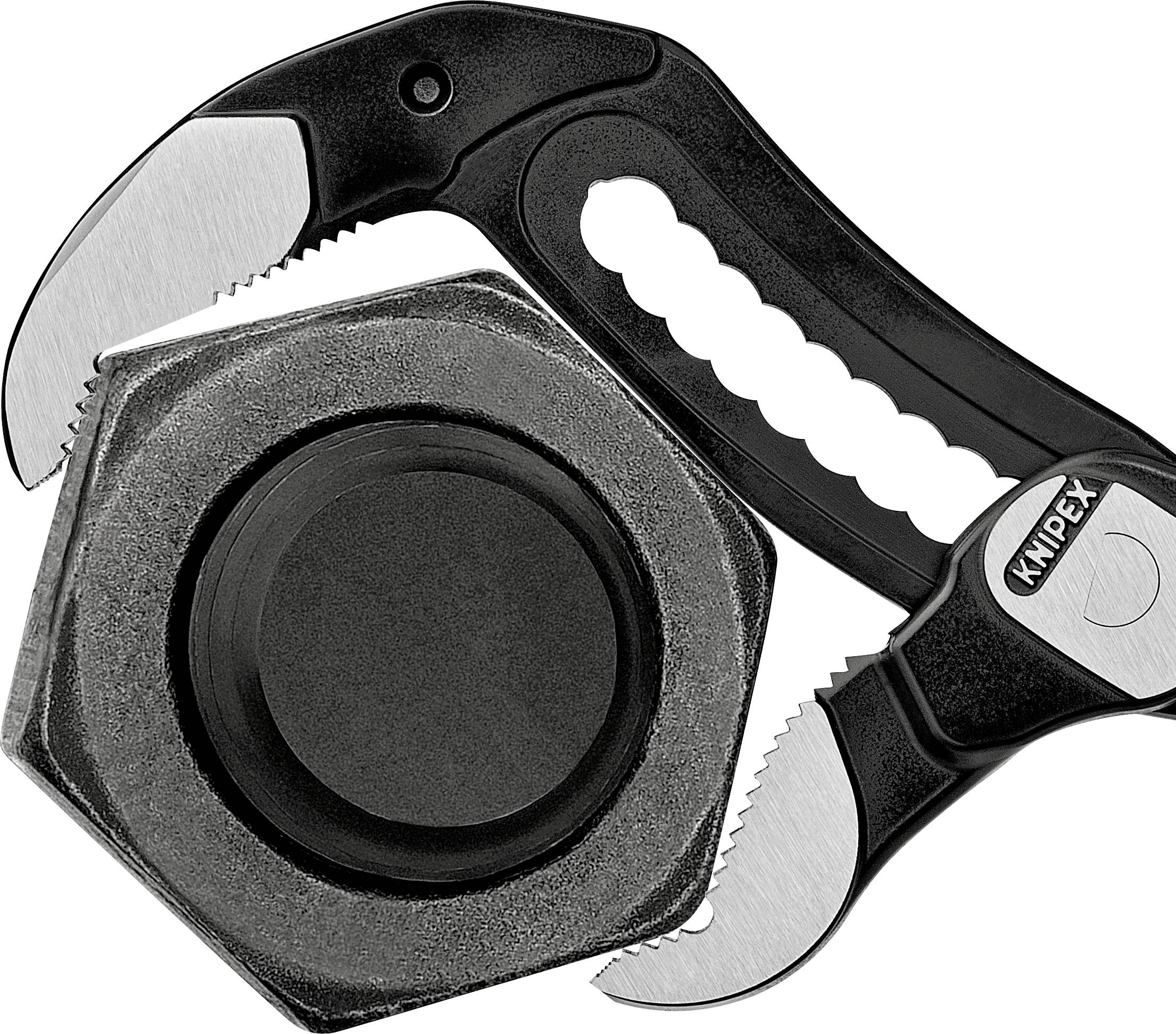 A spanner encompasses a large hexagonal nut.