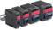 Four black Traco Power switch-mode power supplies lined up. They display technical specifications on the red labels.