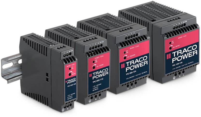 Four black TRACO POWER switch-mode power supplies in different sizes, lined up side by side. Front side displays product information.
