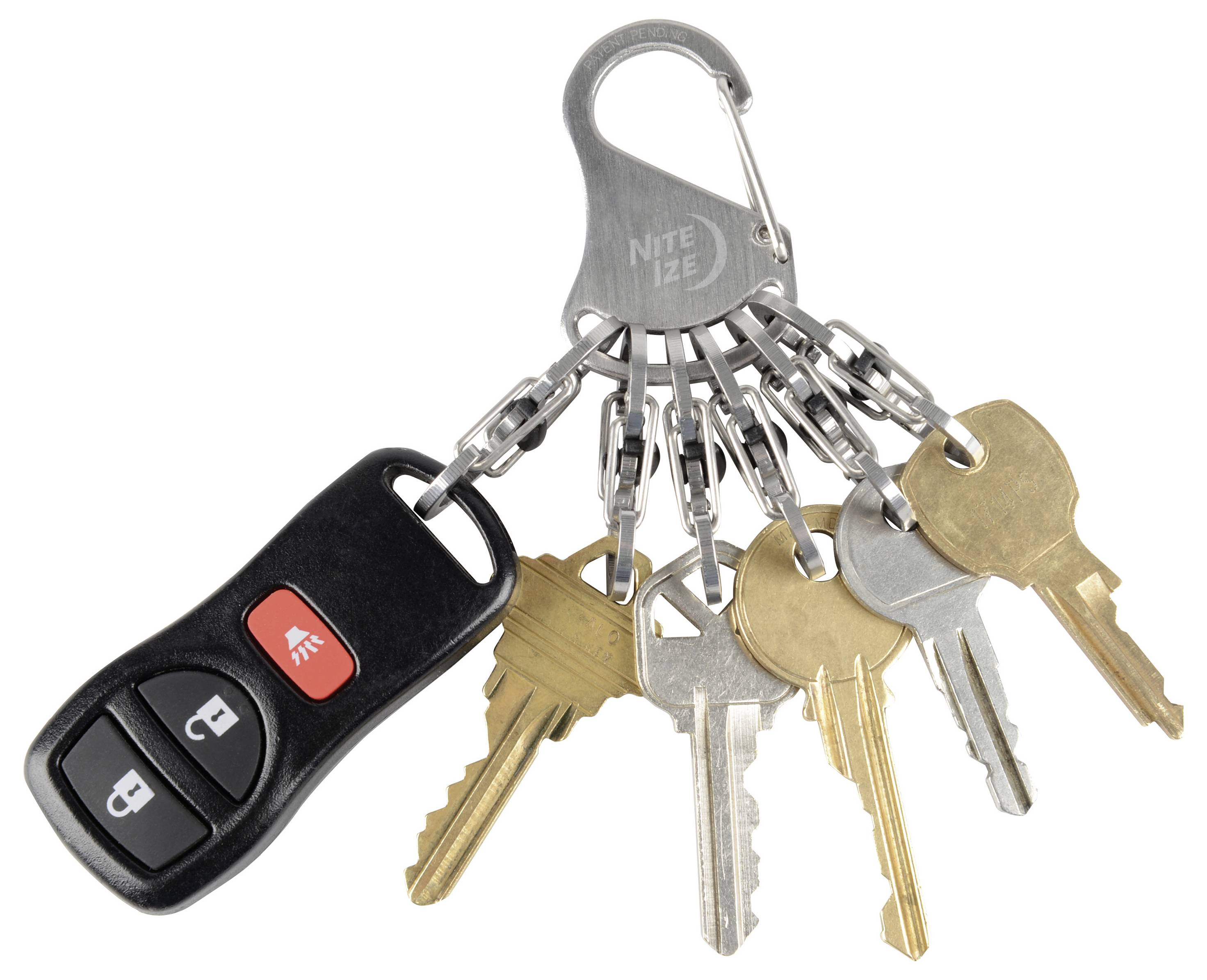 A car key fob with red and black buttons is attached to a key organizer with multiple brass and silver house keys.
