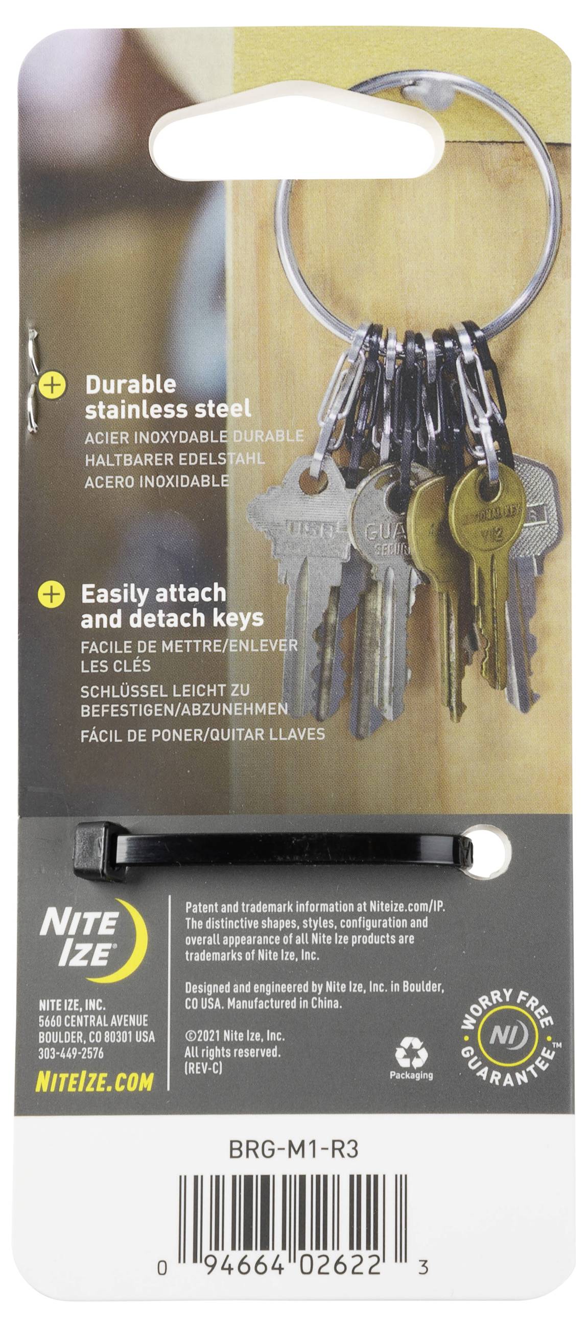 Package displaying key holder with multiple keys, promoting 'Durable stainless steel' and 'Easily attach and detach keys.' Contains product guarantees.