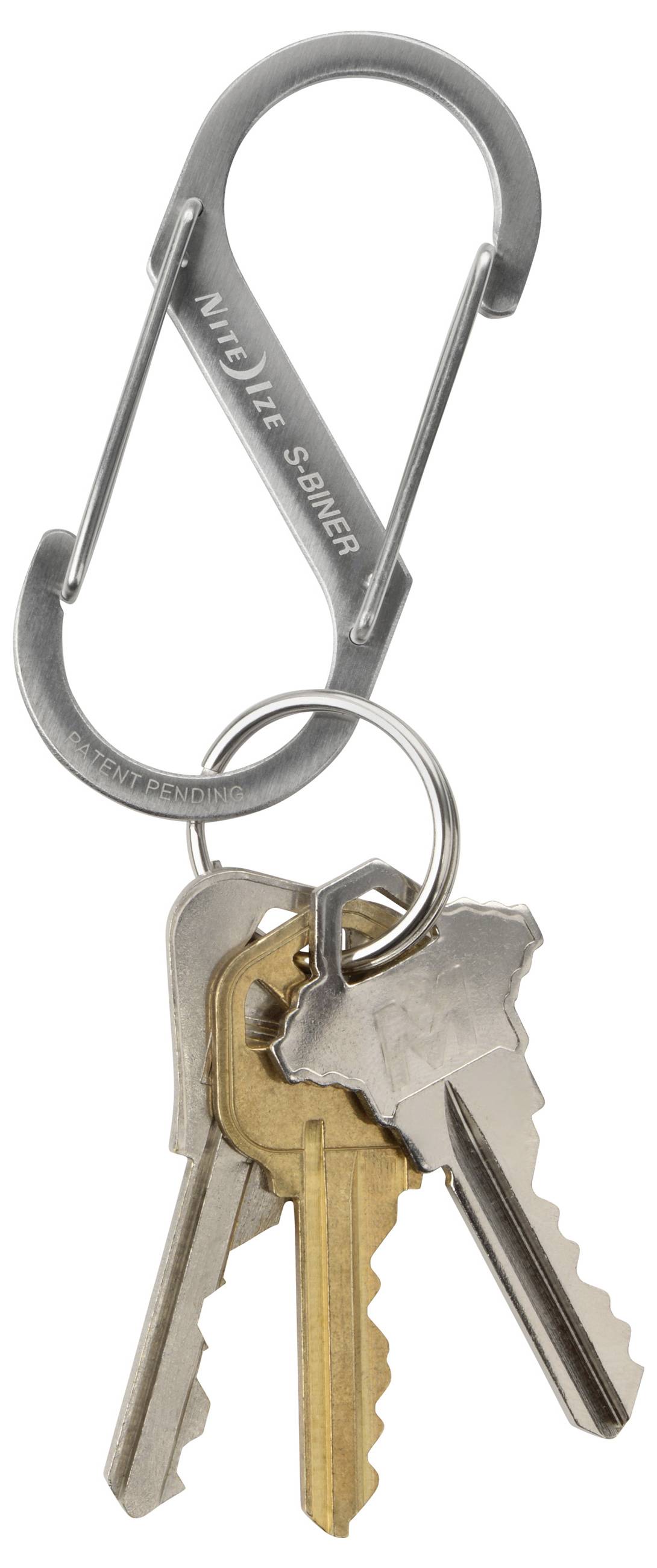 'A metal carabiner key holder with three metal keys attached, including two silver keys and one brass key.'