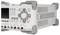 A grey electrical measuring device with buttons and rotary controls on the front, enabling precise control and measurement of voltages.