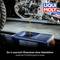 'Changing motorcycle oil in a container. DIY oil change without a car lift. Separate bleed screw set by LIQUI MOLY.'