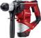 Red and black rotary hammer drill with additional side handle, suitable for construction and renovation work.