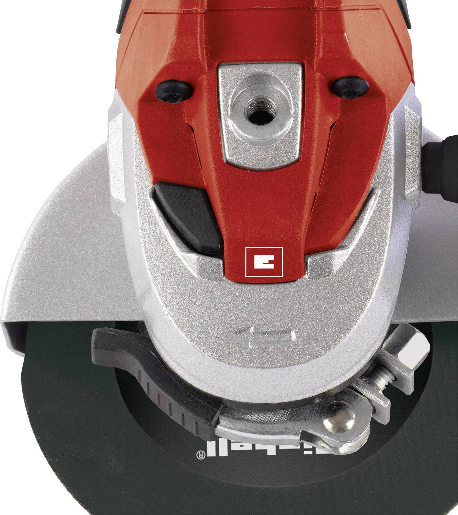 A red and silver angle grinder, closely photographed. It shows the rotating grinding disc and the front part of the housing.