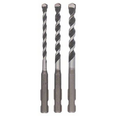 Three drill bits side by side in different sizes on a light background. They are suitable for use in electric drills.