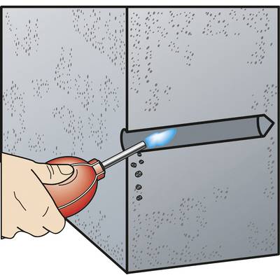 A human hand with a blowtorch heats a metal rod protruding from a wall in order to shape or weld the metal.