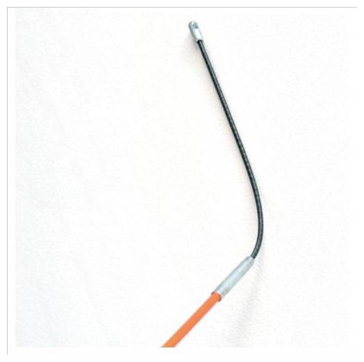 A long, curved staff with a silver tip on a light background.