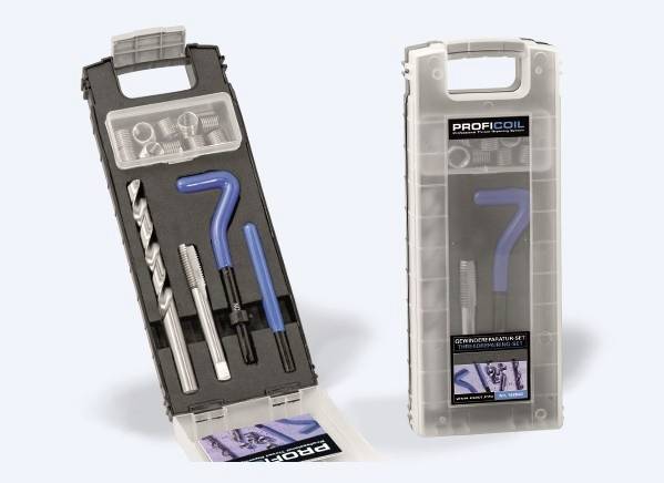 'Two opened professional toolboxes with drill bits, taps and a blue angle tool for thread repair.'