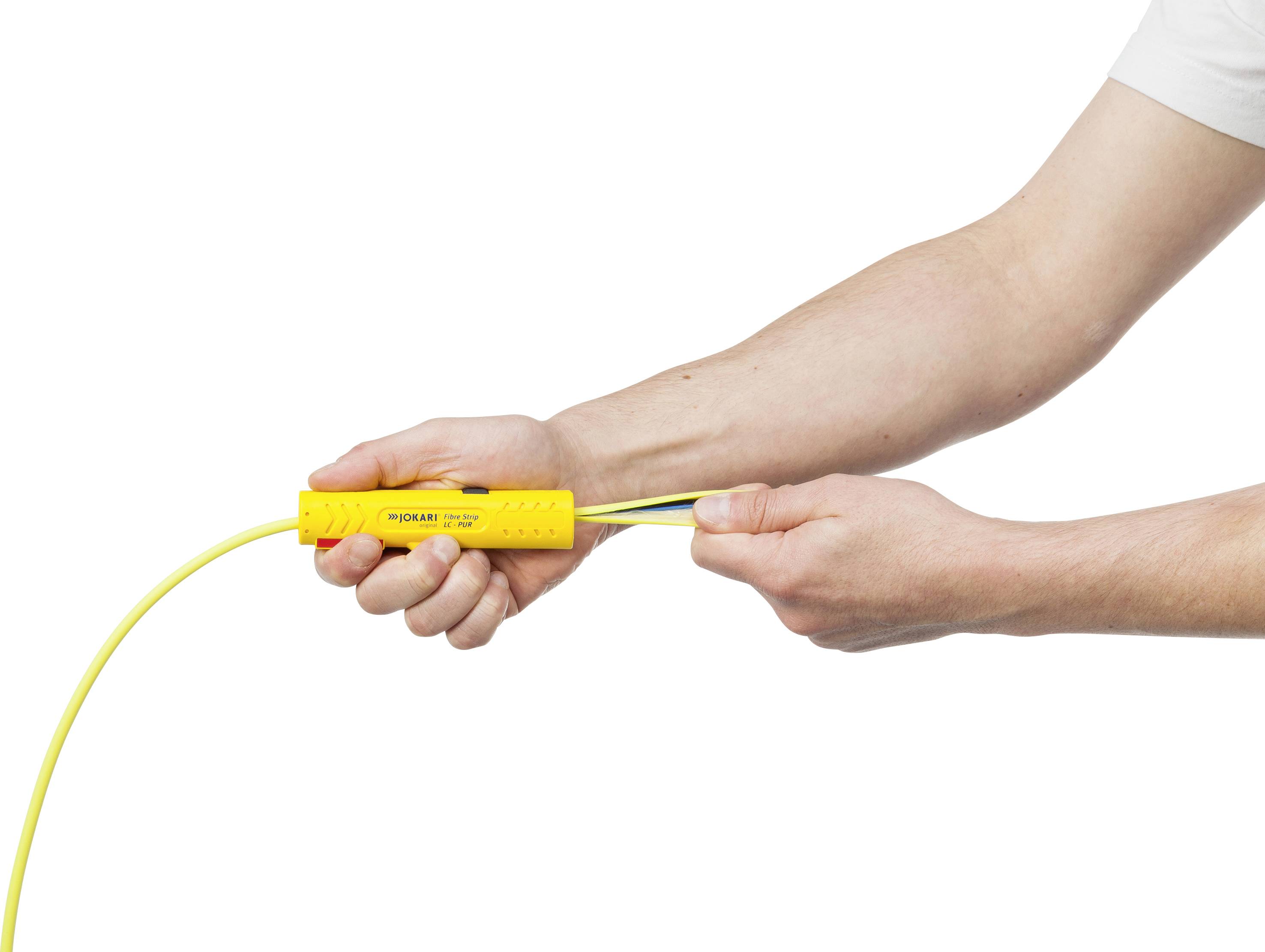'A person is holding a yellow cable tool.'