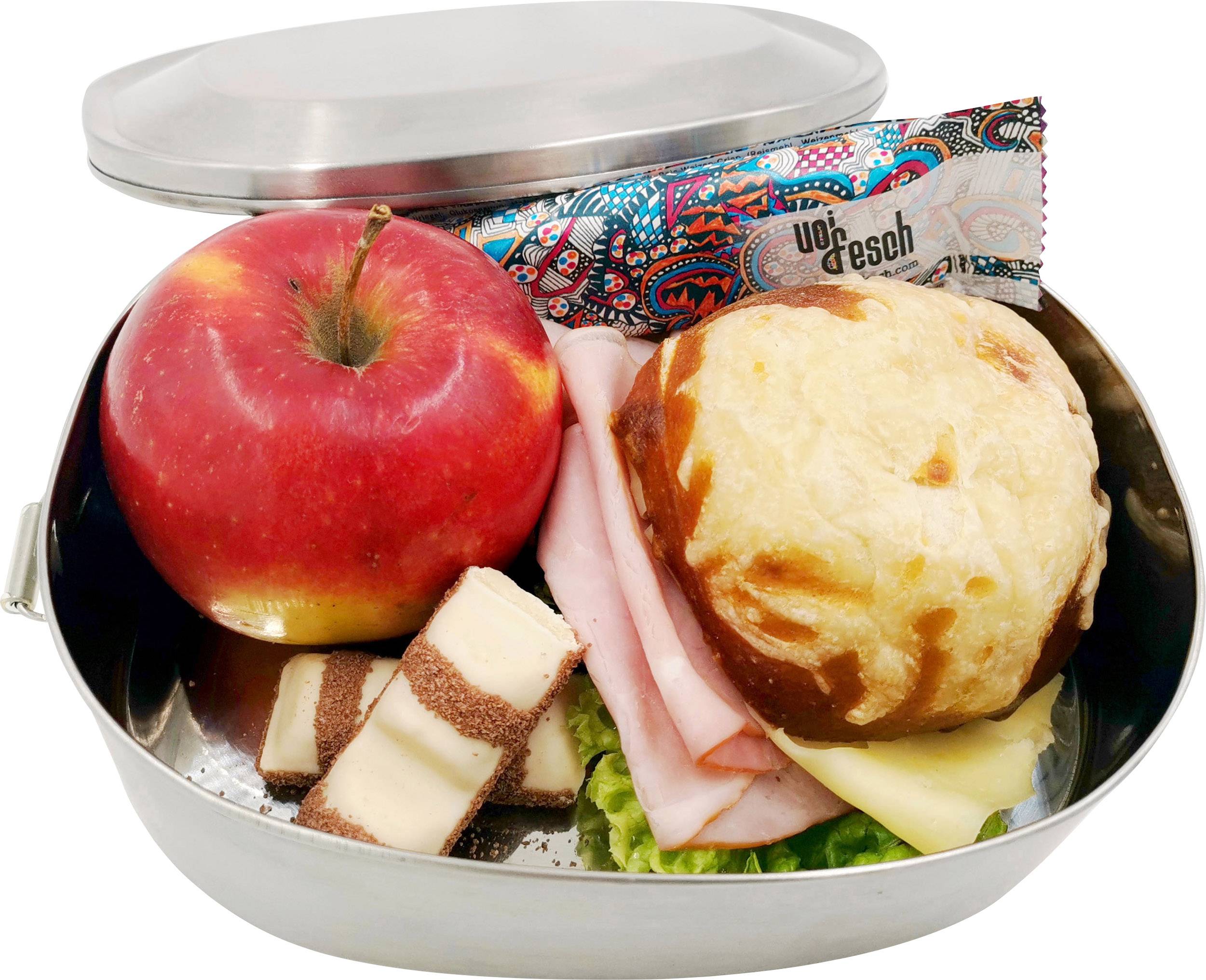 An open lunchbox containing an apple, a cheese roll, ham, chocolate, and a colourful cereal bar.