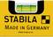 Spirit level by Stabila, yellow with visible spirit bubble. Text: 'Made in Germany', URL 'www.stabila.de'.
