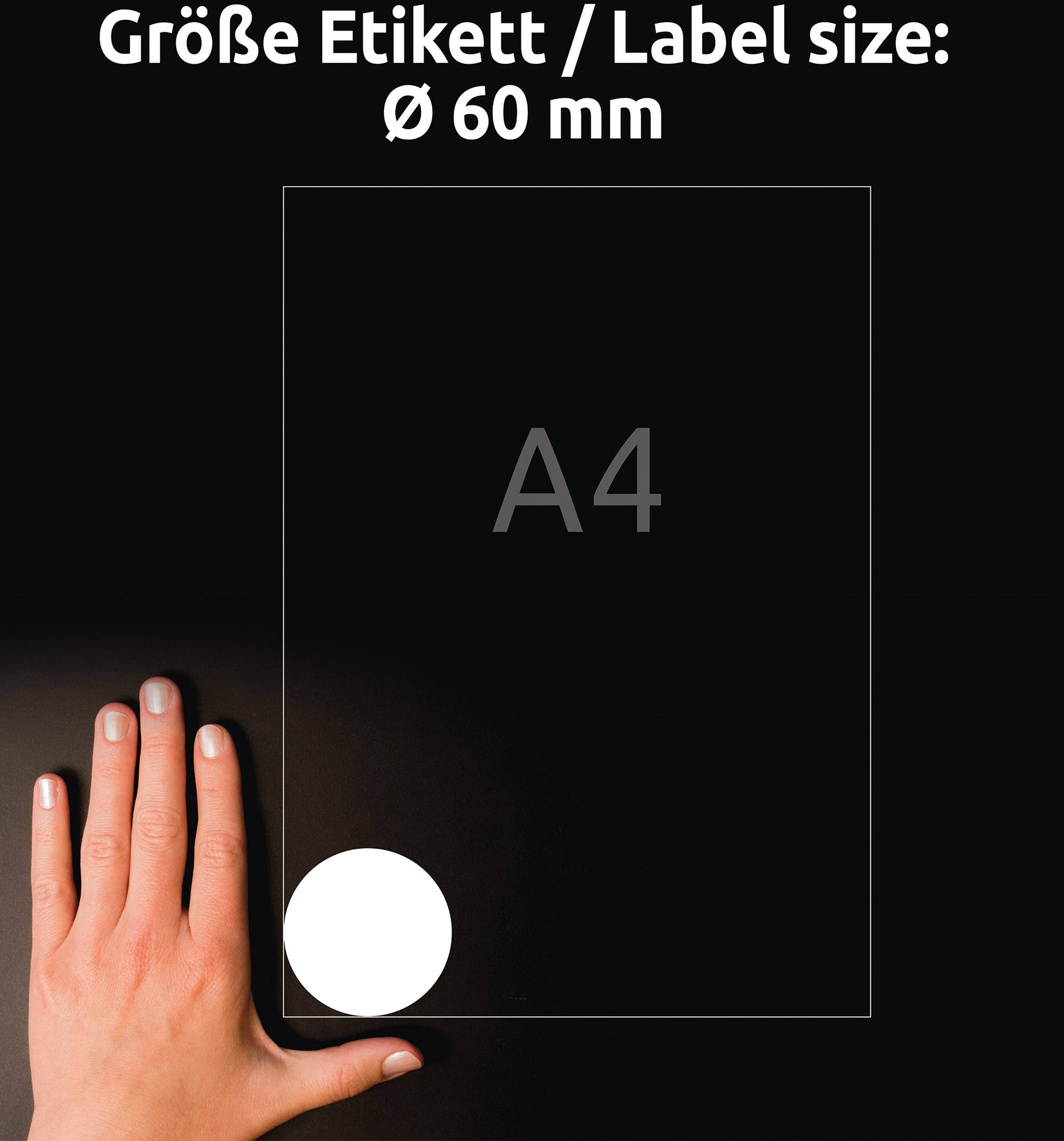 The image shows a hand next to a rectangular A4 sheet with a round label of 60 mm in diameter.