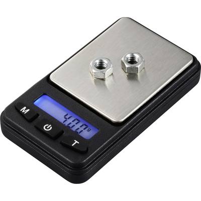 Two nuts are being weighed on a digital scale with a blue display, which shows a weight of 40.0 grams.