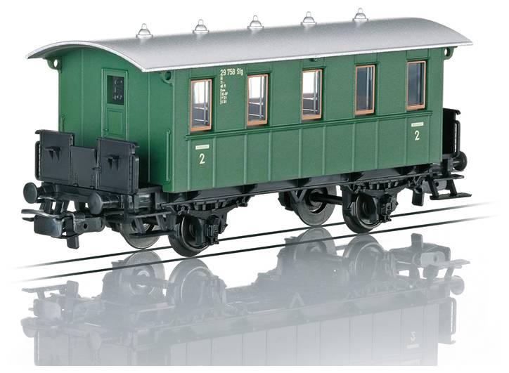 A green vintage train car with four windows and numbered '2'. It has two axles and is positioned on tracks, reflecting on a shiny surface.