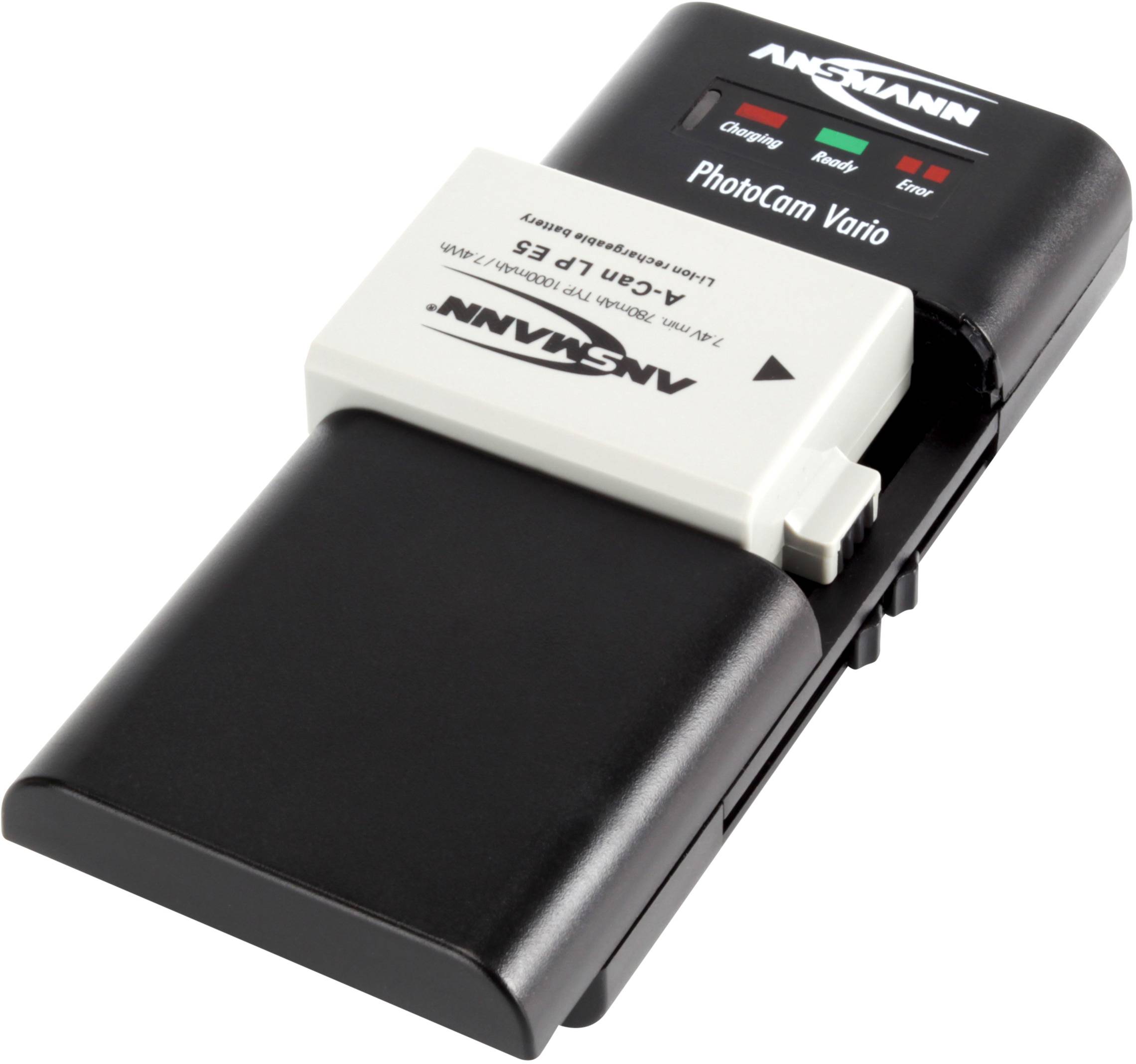 A charger is charging an Ansmann battery. The device indicates charging status with red and green LEDs. It is suitable for camera batteries.
