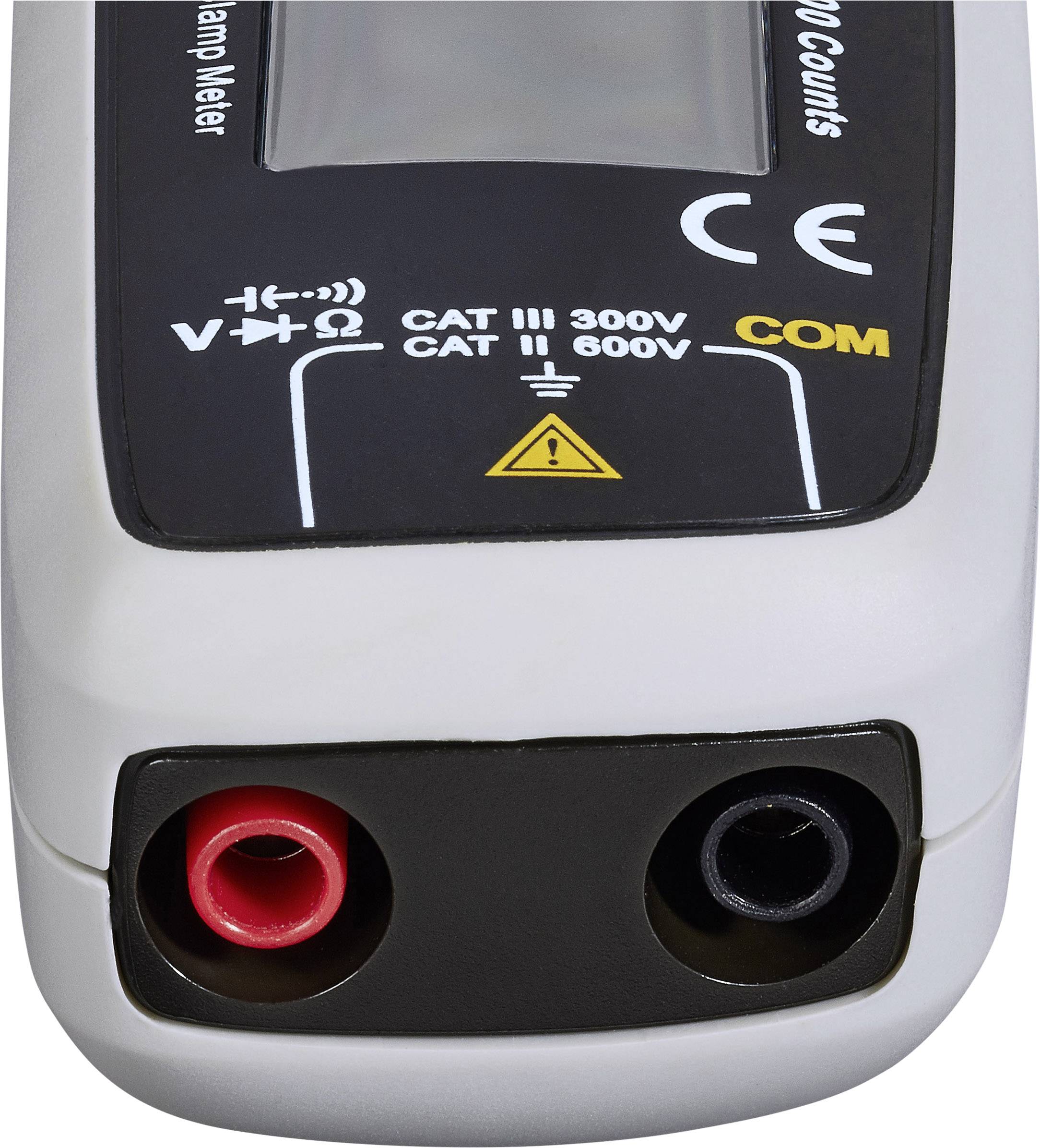 A digital multimeter displays measurement ranges for voltage and resistance on its front panel. Two terminals are visible.