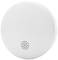 A round smoke detector made of white plastic with ventilation slots in the centre for detecting smoke or fire.